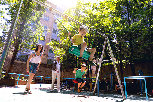 ppy kids playing outdoor at the park