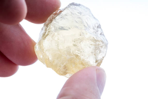 istock Topaz, mineral stone sample with white background 1091751882