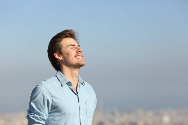 istock Happy man breathing deeply fresh air outskirts 1091752802