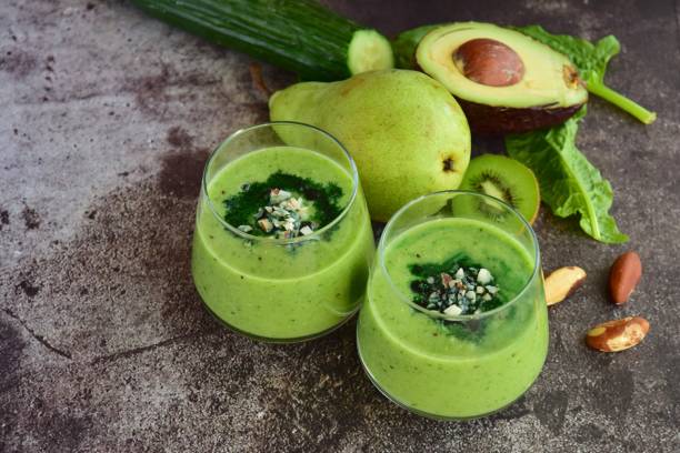 istock Green smoothie with kiwi, cucumber, avocado, spinach, pear and brazil nuts 1091754932