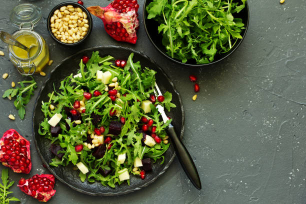 istock Fresh salad of arugula, beet and cheese. 1091763684