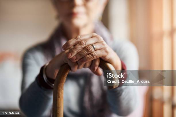 I Get By With A Little Help From My Cane Stock Photo - Download Image Now - Senior Adult, Aging Process, Hand