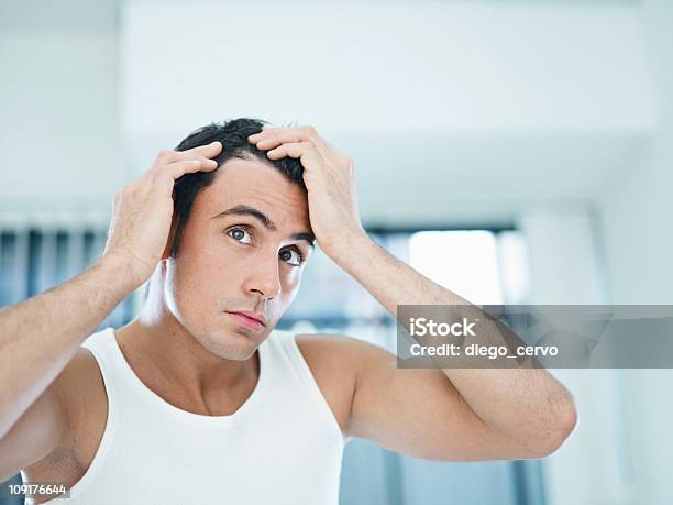 Male Beauty Stock Photo - Download Image Now - Men, Hair Loss, Examining