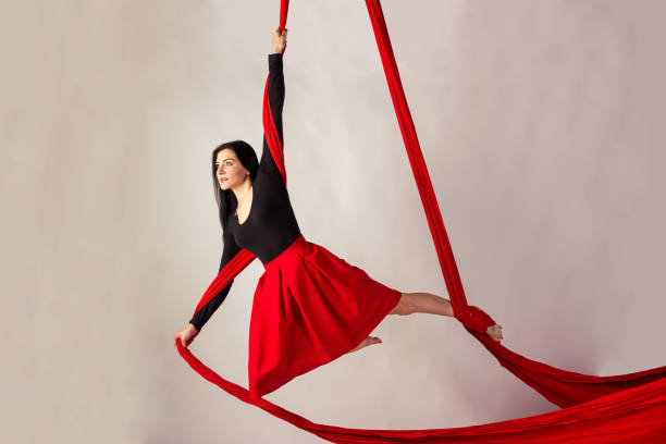 istock Girl training on aerial silks 1091766634
