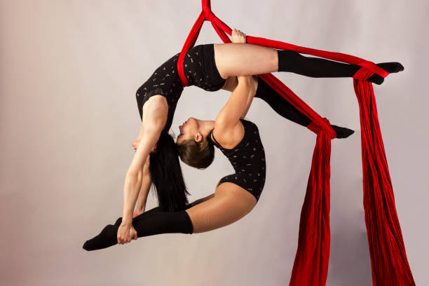istock Girls training on aerial silks 1091766996