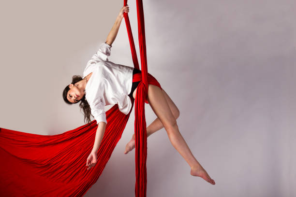 istock Girl training on aerial silks 1091767428