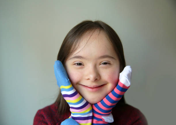 istock Beautiful girl smiling with socks 1091767762