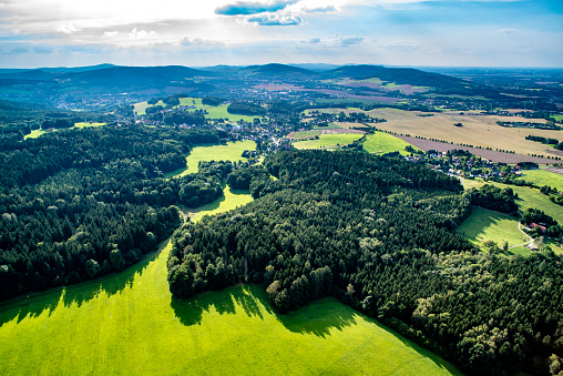 Aerial photographs of villages, forests and roads