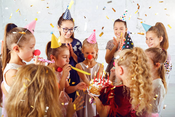 istock Children with a birthday cake have fun. 1091770474