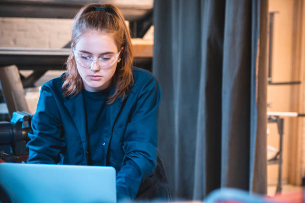 istock Aspiring young engineer trying to complete her project at the workshop 1091773952