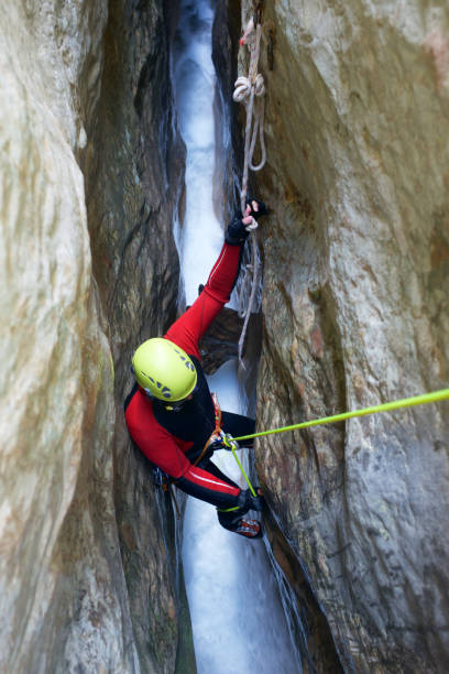 Canyoneering in Spain Canyoning in Gorgonchon Canyon, Guara Mountains, Huesca Province, Aragon, Spain. canyoneering stock pictures, royalty-free photos & images