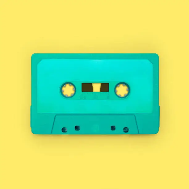 Cassette tape close up, blank for customisation of label, isolated and presented in punchy pastel colors, for nostalgic creative design web & print