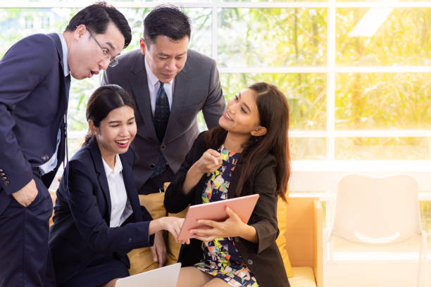 istock Business people talking at cafe window 1091784726