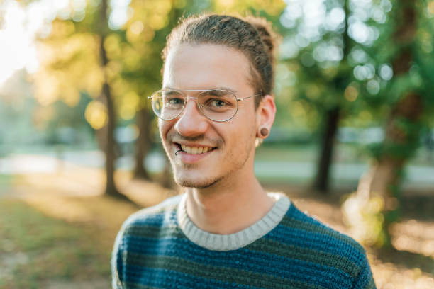 istock handsome young guy in the park 1091785284