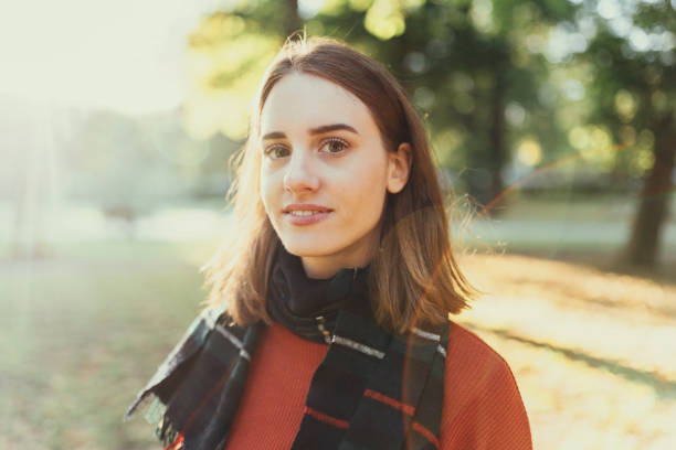 istock Smiling woman in the park 1091785480