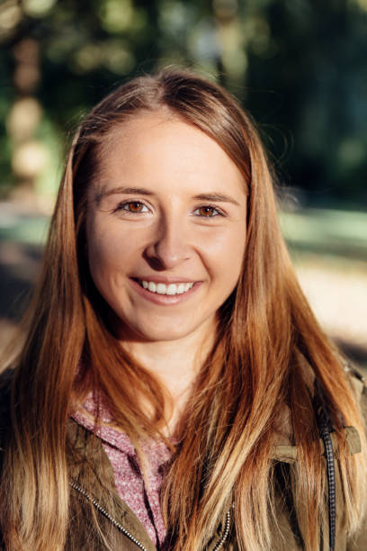 istock Smiling woman in the park 1091785534
