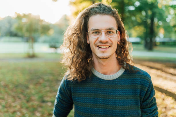 Pierced young guy in the park