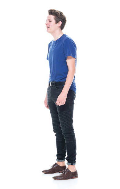 istock Young high school age male with hands by side 1091787160
