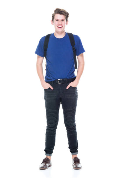istock Young high school age male student wearing a backpack and with hands in pocket 1091787298