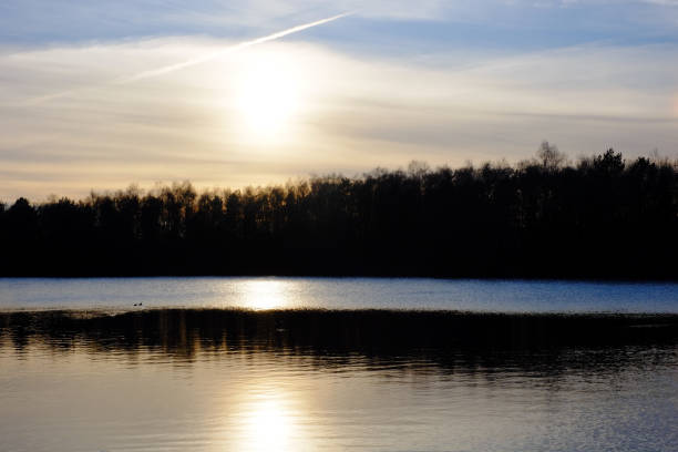 istock Beautiful lake and forest during sunset 1091789898