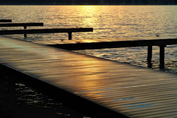 istock wooden pier at sunset 1091794228