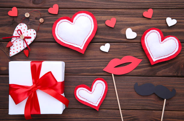 istock Valentine's day background with decoration on brown background. 1091797948