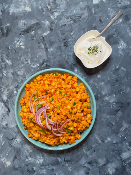 istock Turkish bulgur pilaf with chickpeas and tomatoes. 1091798168
