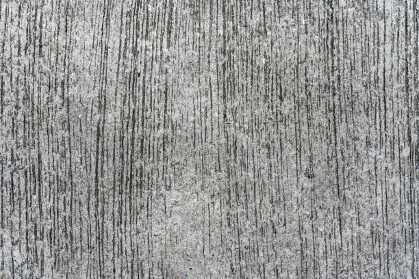 Scratched outdoor concrete road floor texture. Perfect for background.