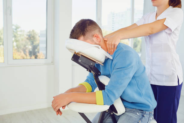 istock Massage on the massage chair in the office. 1091799880