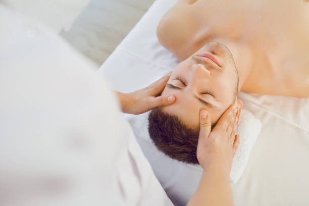 istock Facial massage for man. 1091799918