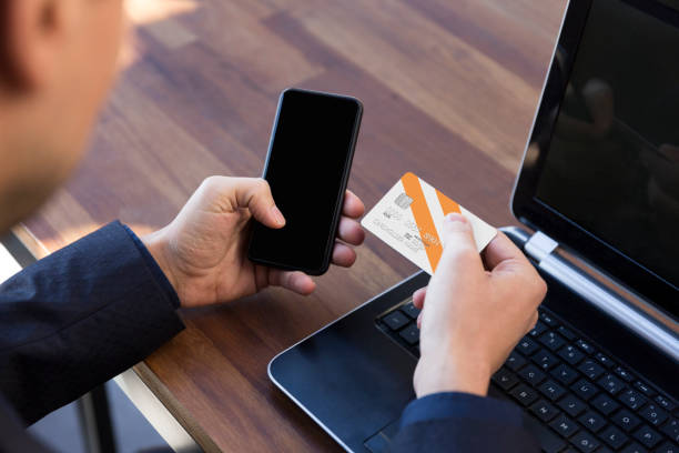 istock Man is shopping online with smartphone 1091807332