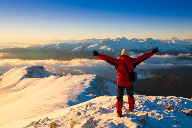 istock A man in mountain sunset winter. Unique. Christmas 1091809530