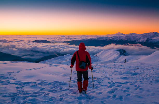 istock A man in mountain sunset winter. Unique. Christmas 1091809670