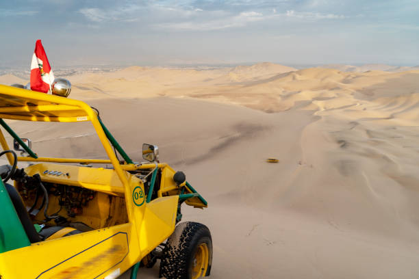 istock Beach buggy on beside Oasis in Huacachina, Peru 1091813104