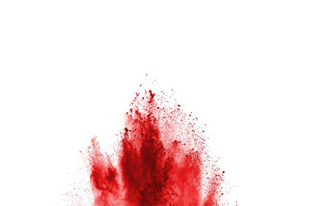 istock Freeze motion of red powder exploding, isolated on white background. Abstract design of red dust cloud. Particles explosion screen saver, wallpaper 1091816614