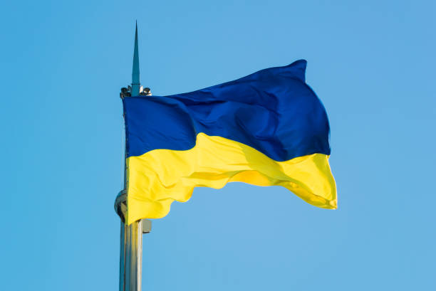 istock A beautiful yellow-blue Ukrainian flag develops in the wind on a sunny day against a clear sky 1091817594