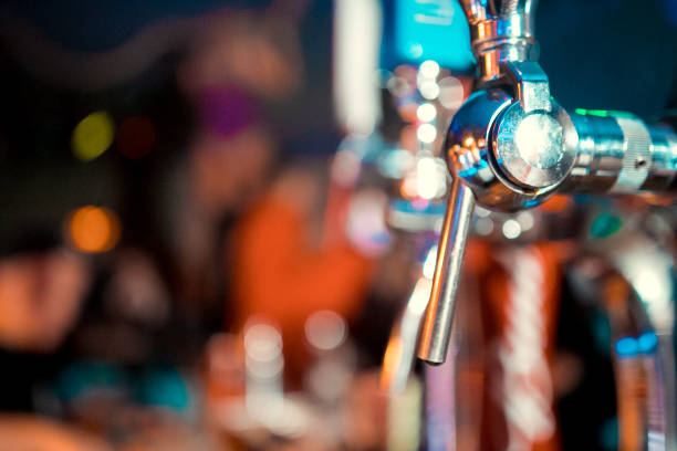 istock Shiny beer taps in a row in a bar 1091828878