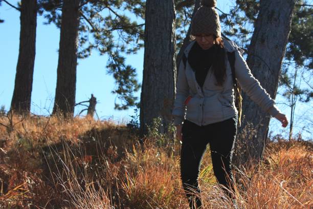 istock a young woman makes trekking on a mountain 1091836532