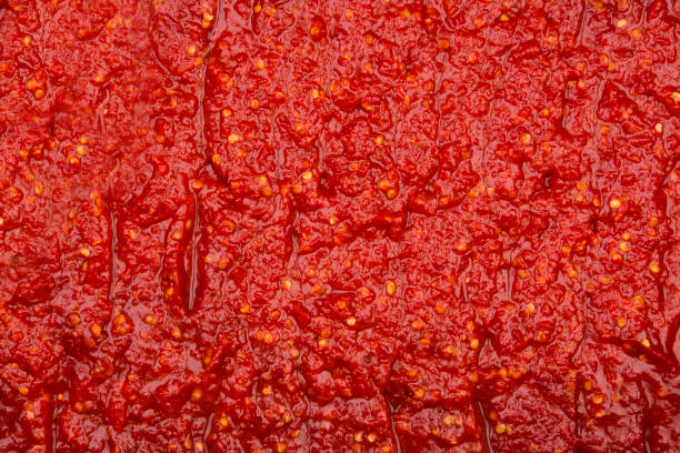 tomato paste background - fruit sauce imagens e fotografias de stock
