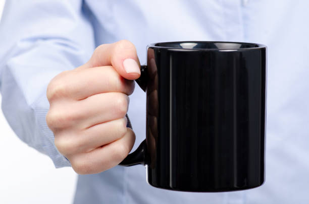 istock Woman in hand black cup mug 1091844704