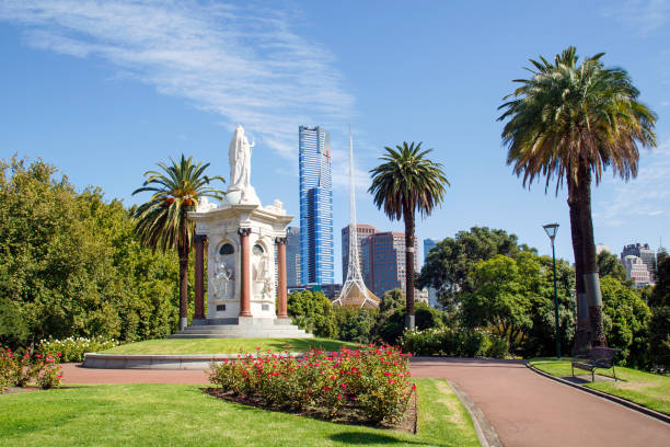 Queen Victoria Statue in Victoria Gardens is located between St Kilda Road and Alexandria Avenue. Eureka Sky Tower can be seen in the background.