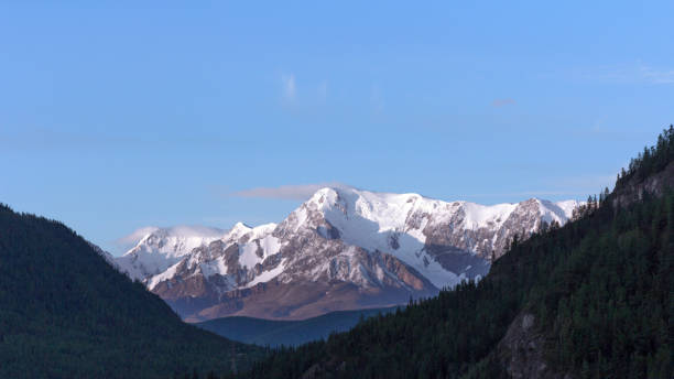 istock Beautiful winter landscape with snow covered mountain peaks 1091852454