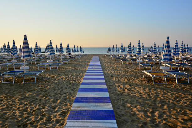 early in the morning at the beach a wonderful morning on the sea rimini stock pictures, royalty-free photos & images