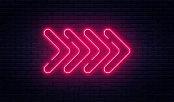 Neon arrow sign. Glowing neon arrow pointer on brick wall background. Retro signboard with bright neon tubes Neon arrow sign. Glowing neon arrow pointer on brick wall background. Retro signboard with bright neon tubes. Vector motel stock illustrations