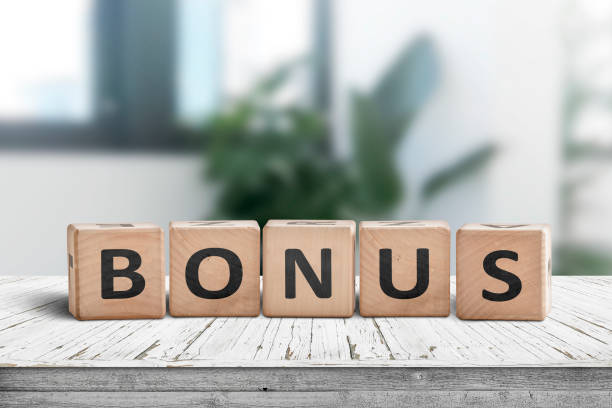 istock Bonus reward sign on a white table in a bright office 1091858432