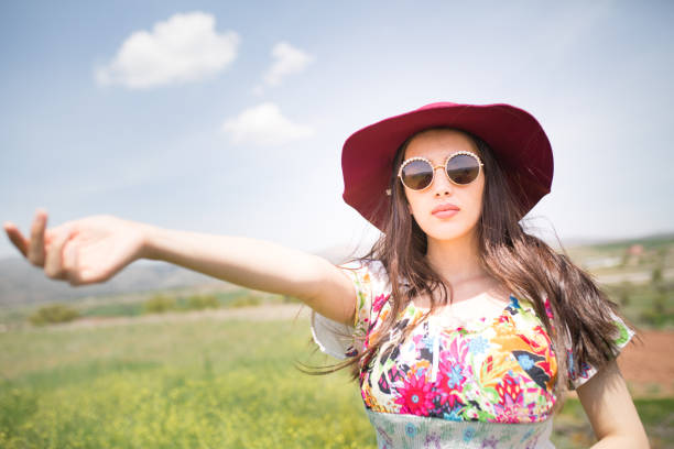 istock female model photography between flowers 1091861416
