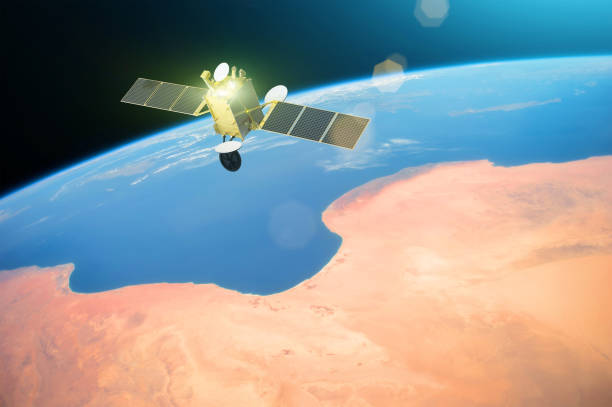 istock Space communications satellite in orbit around the Earth. Elements of this image furnished by NASA 1091861486