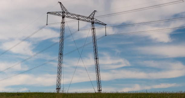 istock cloudy morning sky and a high-voltage line 1091863252