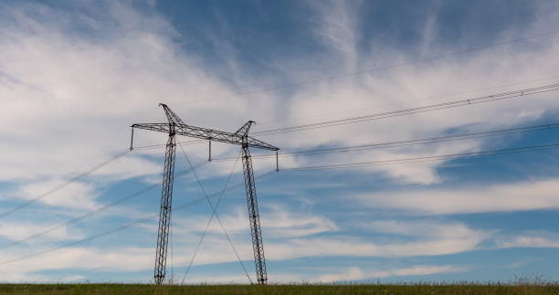 istock cloudy morning sky and a high-voltage line 1091863256