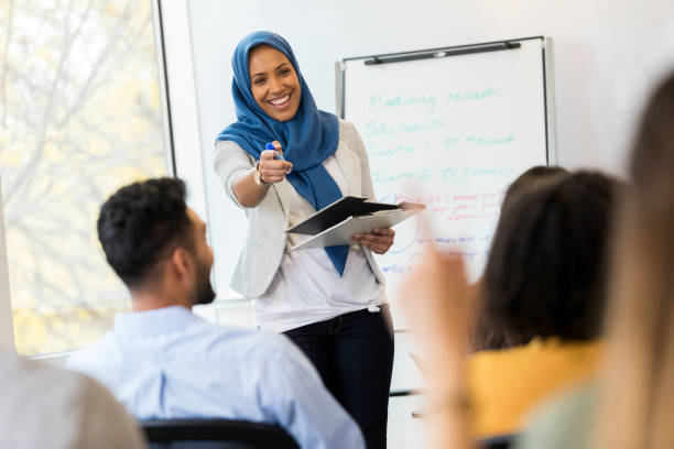 istock Muslim businesswoman enjoys teaching training class 1091866164